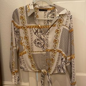 Pretty design. Size S. Very flattering
